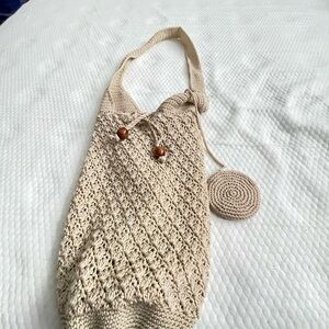 Beige crochet bag ,good condition no holes or stains has it’s extra little bag .